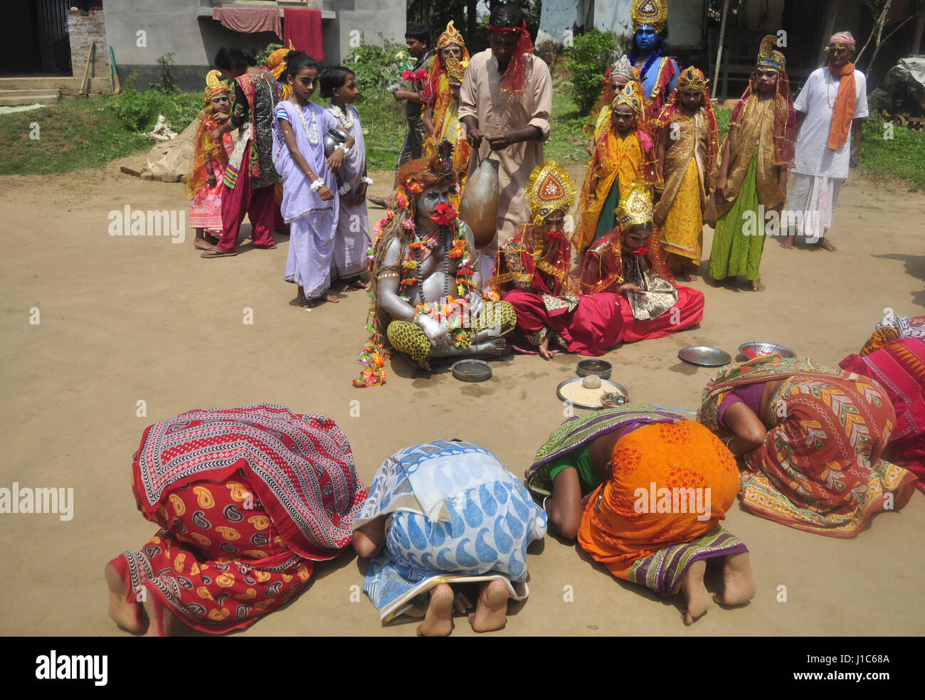'Shiber Gajan', a traditional festival of the Hindu community -  13/04/2017  -  India / Tripura / Agartala  -  INDIA, TRIPURA-APRIL 13:The whole group of -Gajan- is in   a ritual before starting the 'Shiber Gajan',  in the outskirts of Agartala, capital of the Northeastern state of Tripura.                                                    'Shiber Gajan', a traditional festival of the Hindu community in the outskirts of Agartala city in Tripura. In Bengal and areas having Bengali speaking populace, Gajan is a unique festival celebrated in the last two days Chaitra which marks the end of the B Stock Photo