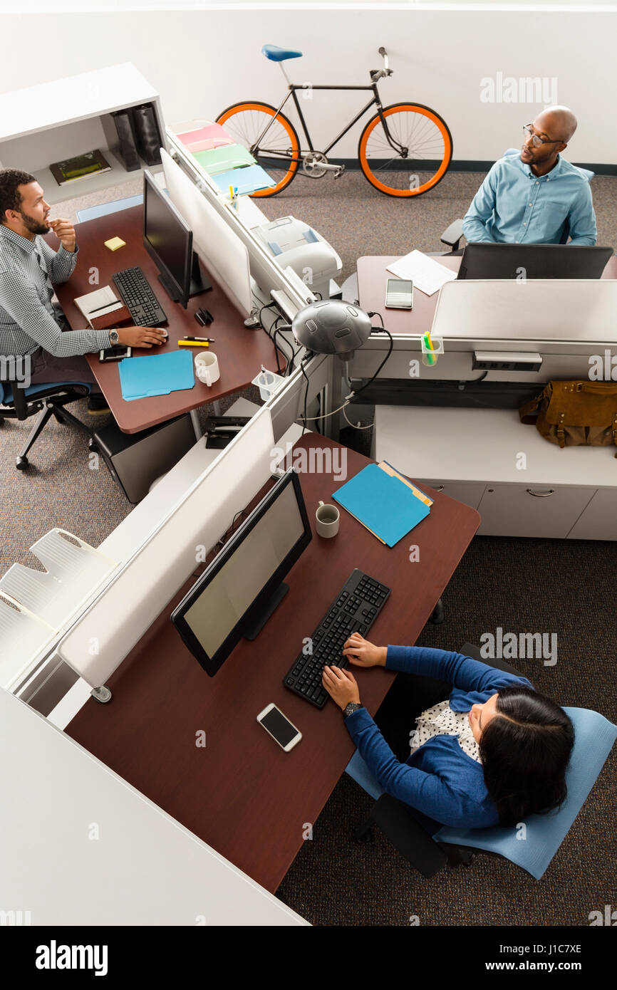 People working at computers in office Stock Photo