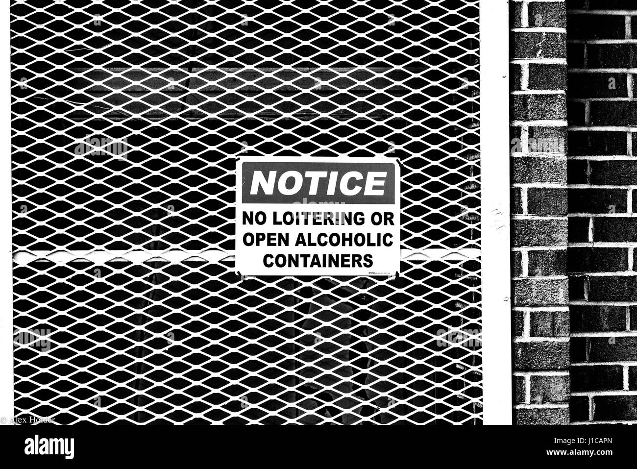 No loitering sign on outside of store Stock Photo