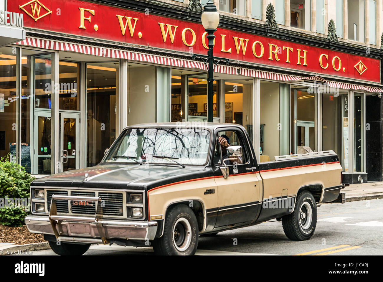 An old truck sits outside the Woolworth counter where a historical sit-in was staged in Greensboro, North Carolina. Stock Photo