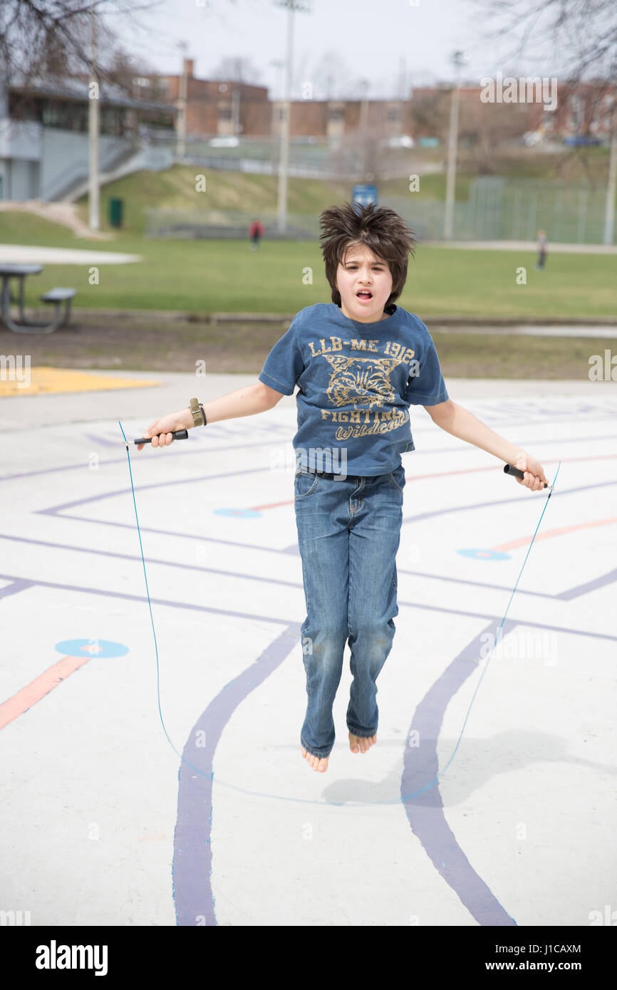Boy skipping rope hi-res stock photography and images - Alamy