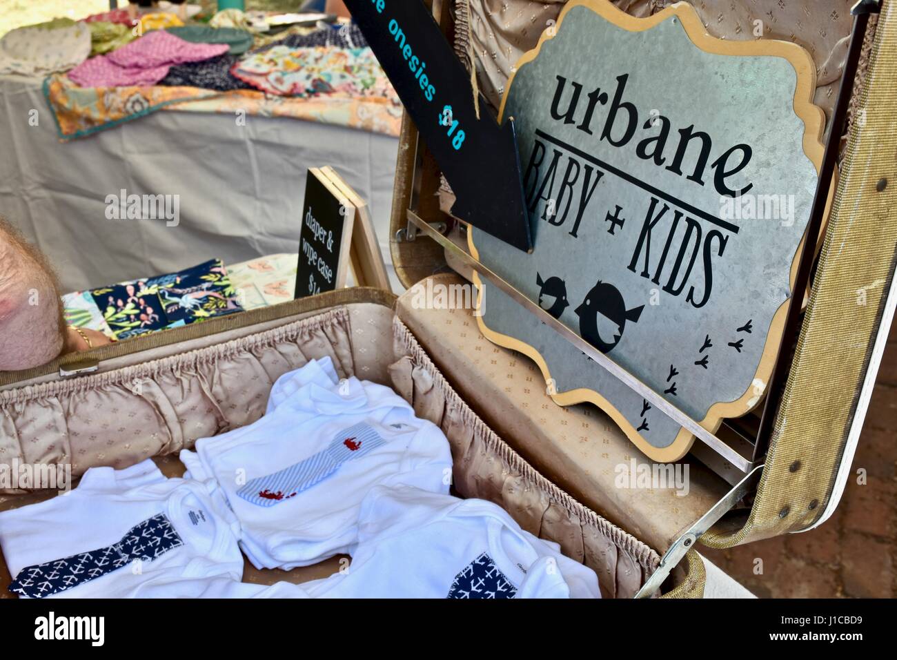 Urbane baby and kids clothes at the Charleston farmers market Charleston, South Carolina Stock Photo