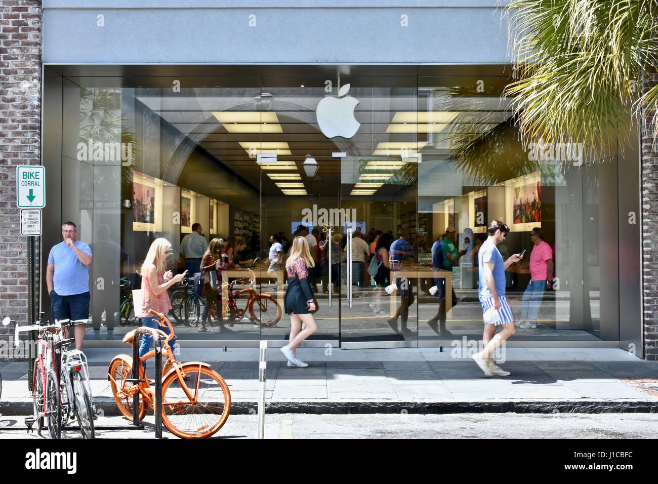 An Apple Store with People Waiting To Purchase Apple Macbooks, IPads and  IPhones Editorial Image - Image of designs, ecosystem: 168250490