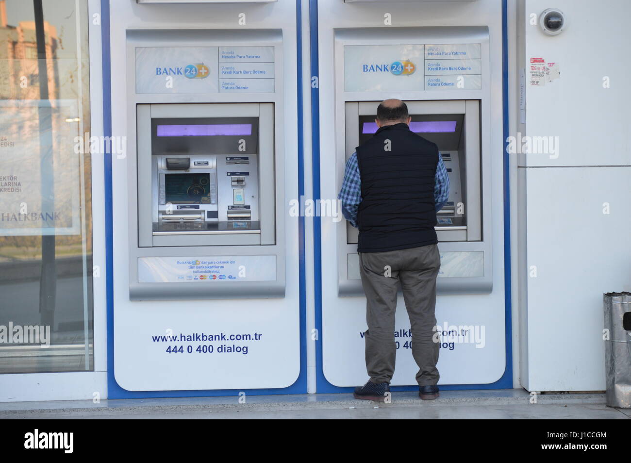 Ankara, Turkey. 20th Apr, 2017. A man uses bank machine (ATM) in the ...