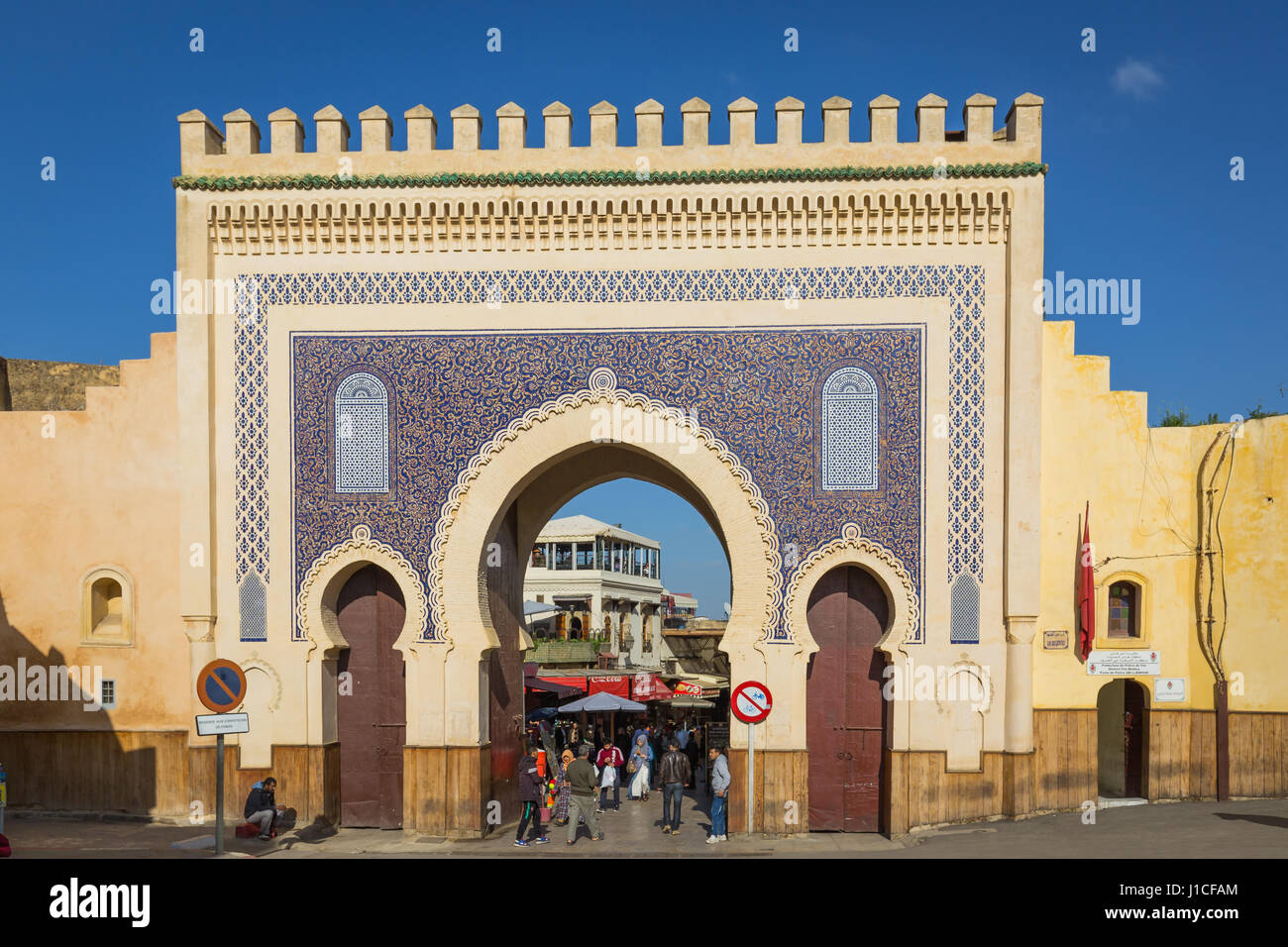 Fes, Morocco - February 28, 2017: Ancient Blue gate in old Medina Stock Photo