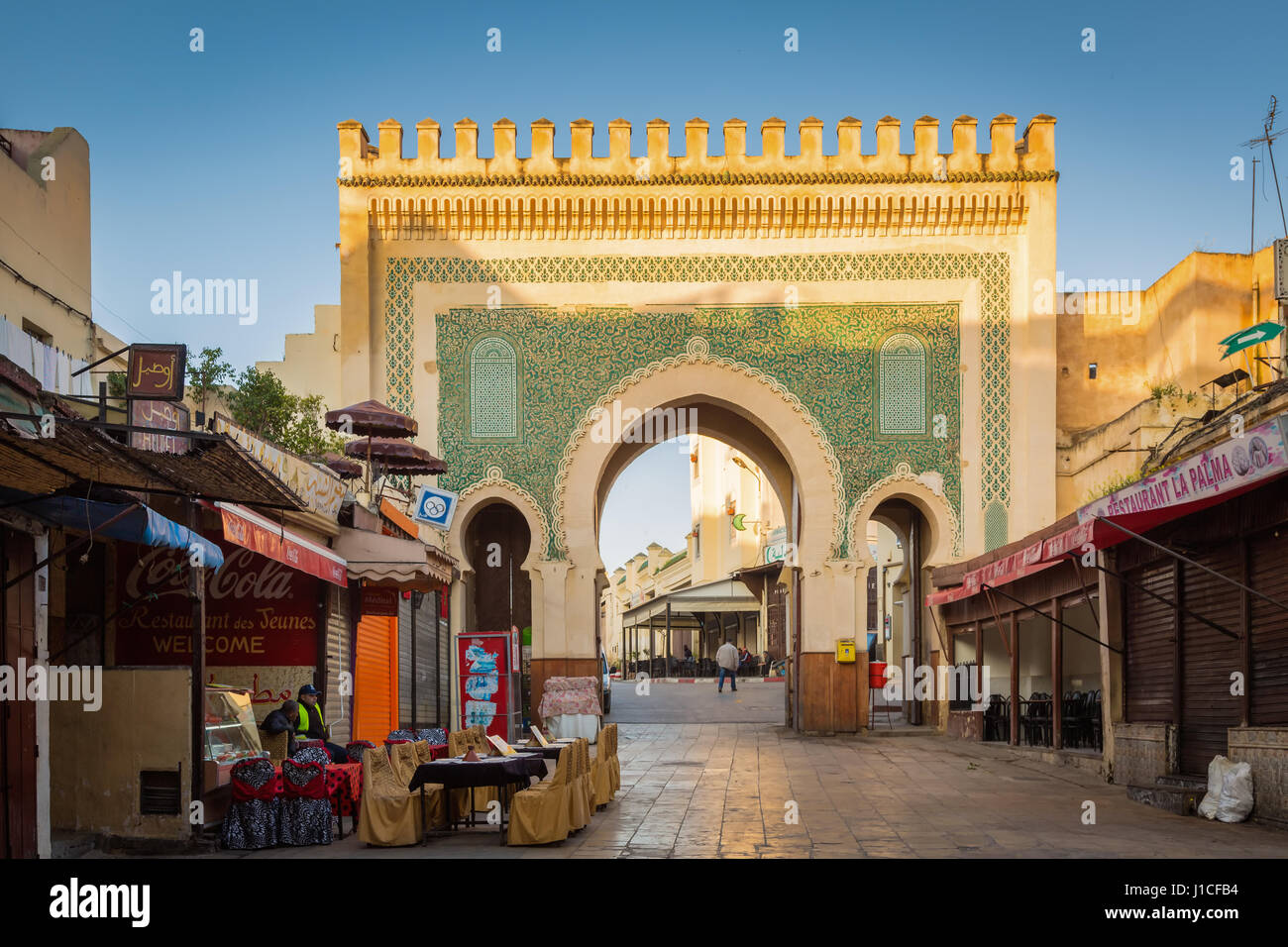 Fes, Morocco - February 28, 2017: Ancient Blue gate in old Medina Stock Photo