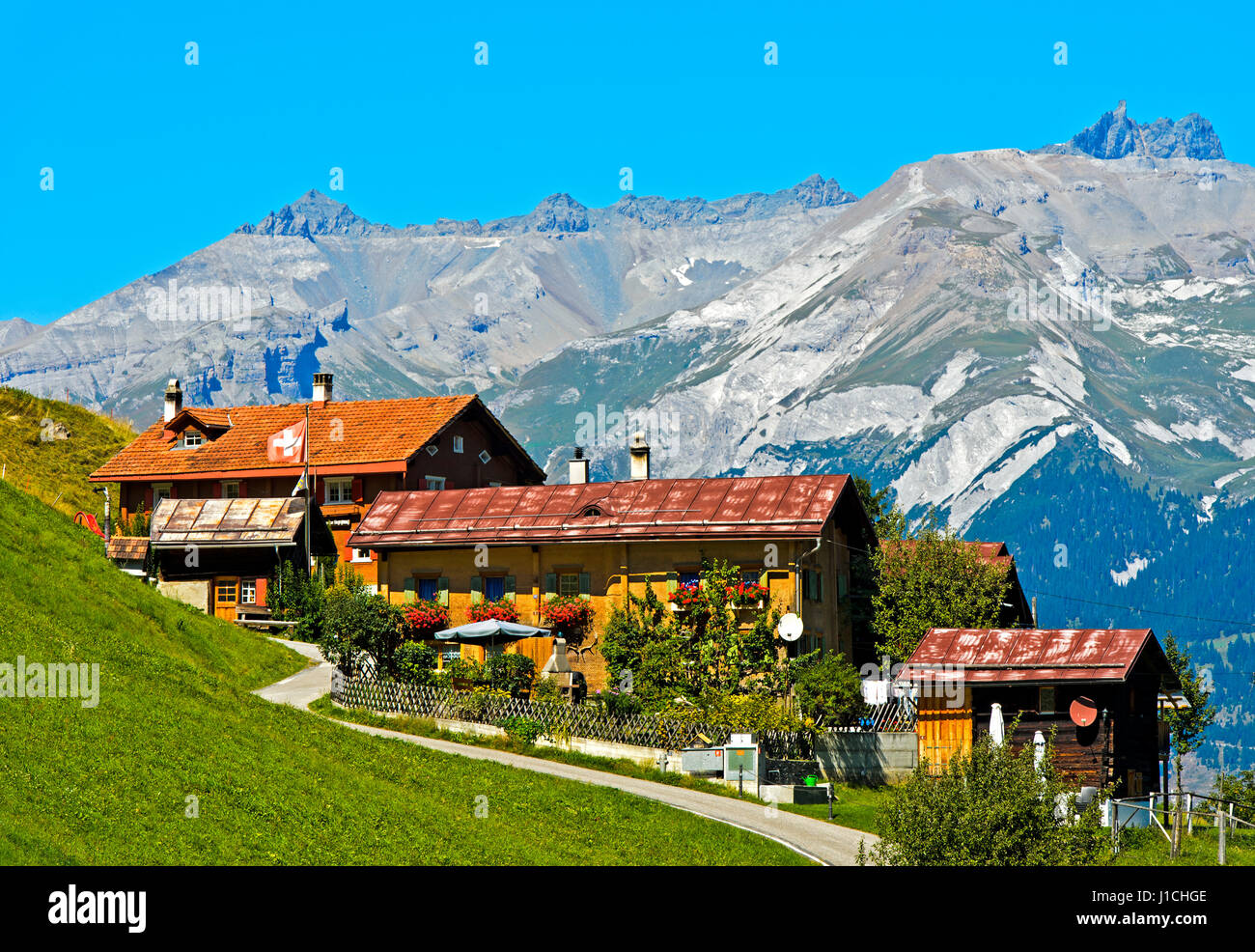 Hamlet Acla, Tenna, Safiental, behind to the right peak Ringelspitz, Grisons, Switzerland Stock Photo