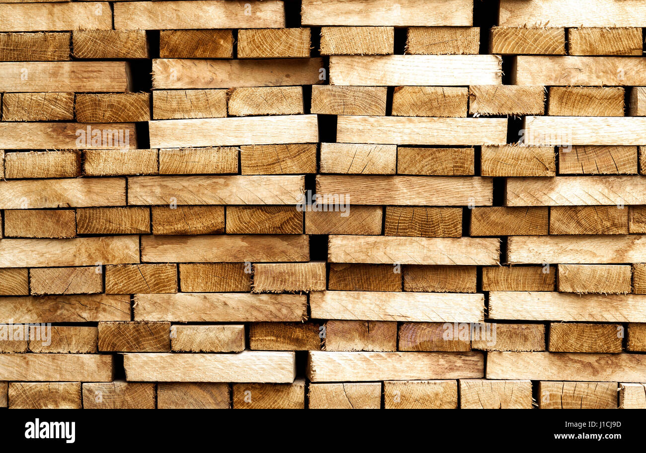 Wood timber construction material background and texture. Stack of
