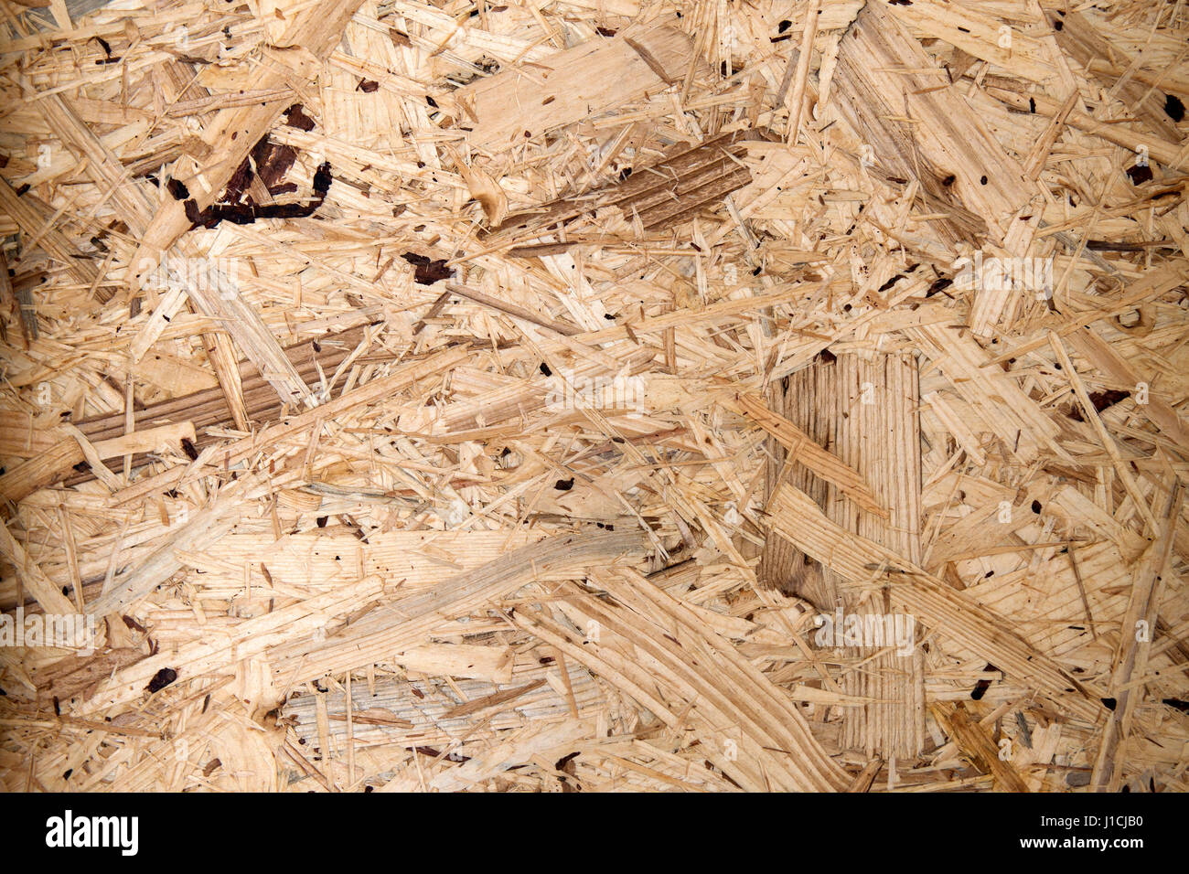 Recycled compressed wood chipboard. Pressed Wooden Panel (OSB Stock
