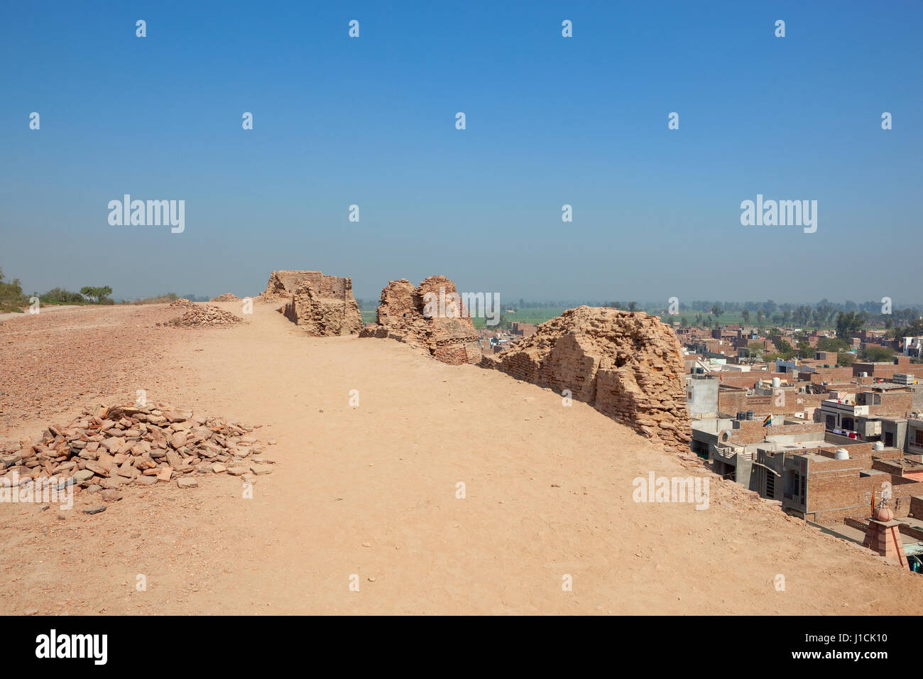 restoration work at the historical site of bhatner fort hanumangarh rajasthan india overlooking the town and countryside under a clear blue sky Stock Photo
