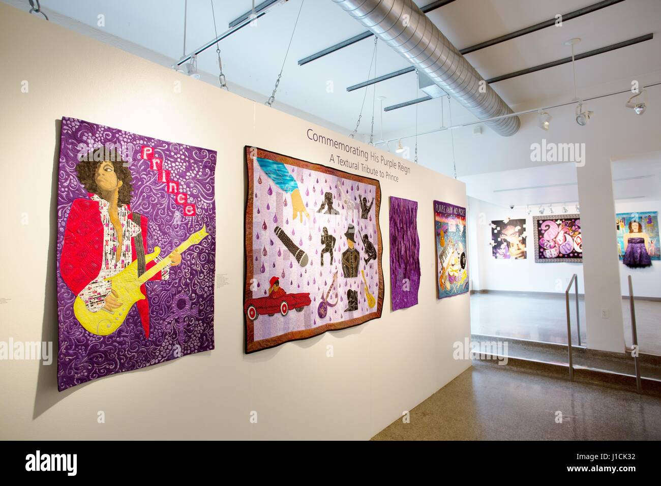 A display of handmade quilts made in honor of Prince, on display at the Textile Center in St. Paul, Minnesota, USA. Stock Photo