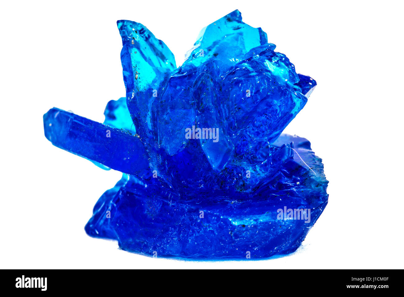 Blue crystals of vitriol, Copper sulfate, isolated on white background
