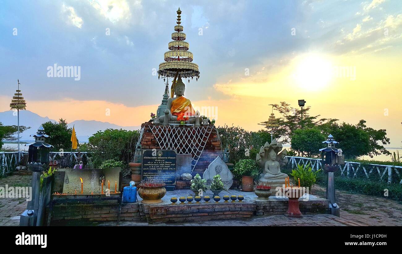 Ancient Buddha statue in wat Tilok Aram at Phayao Lake, Thailand Stock Photo