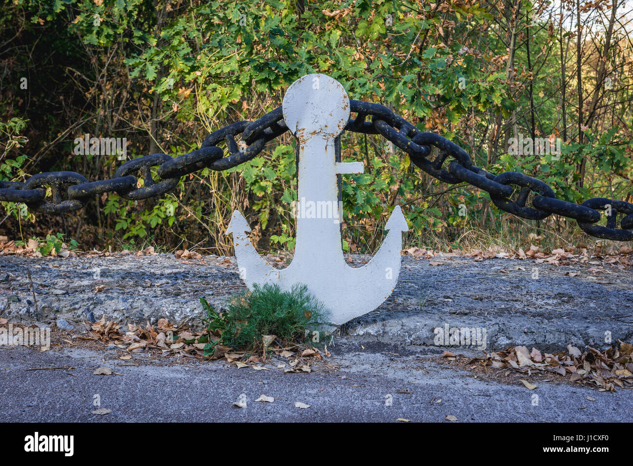 Anchors along the road over backwater of Pripyat River in Chernobyl town, Chernobyl Nuclear Power Plant Zone of Alienation, Ukraine Stock Photo