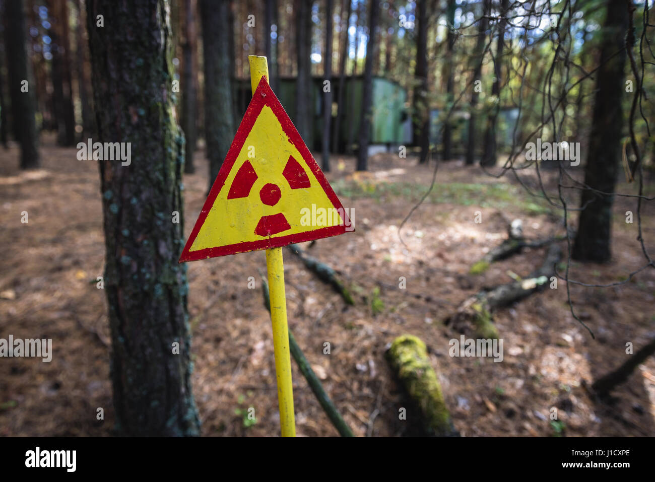 Ionizing radiation warning sign in Pripyat city of Chernobyl Nuclear Power Plant Zone of Alienation around the nuclear reactor disaster in Ukraine Stock Photo