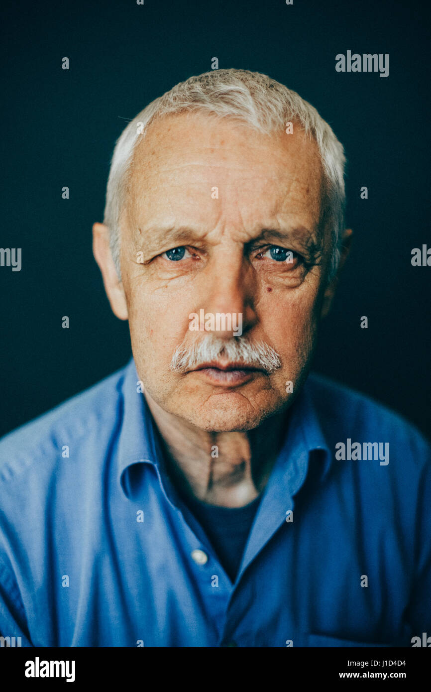 old man looking serious Stock Photo
