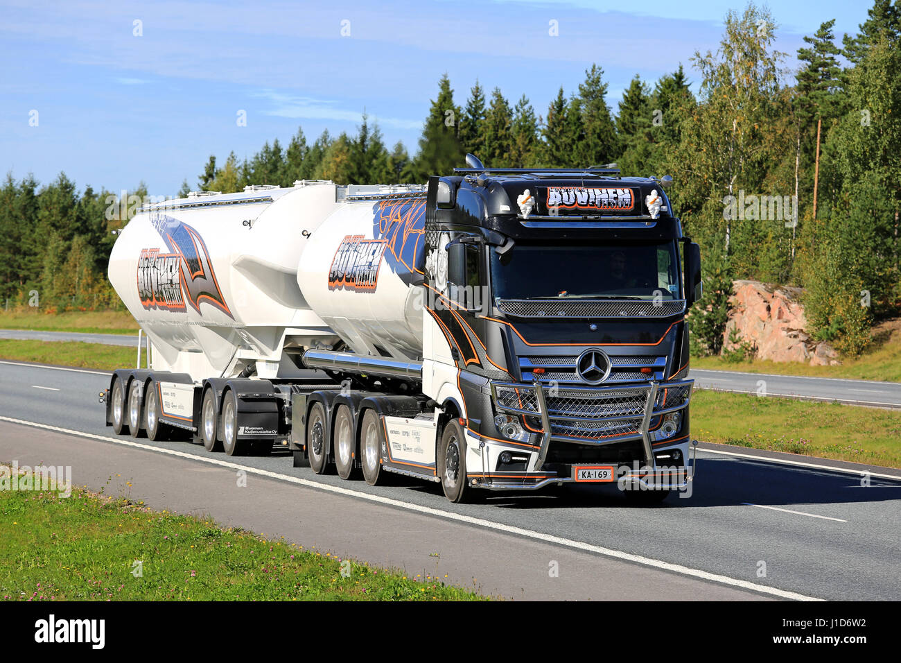 SEPTEMBER 9, 2016: Mercedes-Benz Actros Uniq Concept, the latest super bulk transport truck of Kuljetus Auvinen, trucking along freeway on a sunny day Stock Photo