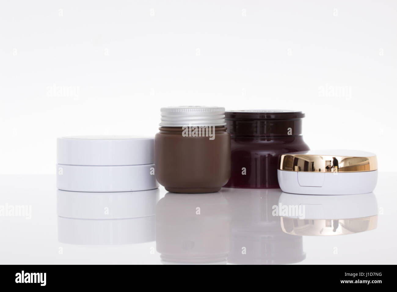 cosmetic containers isolated Stock Photo - Alamy