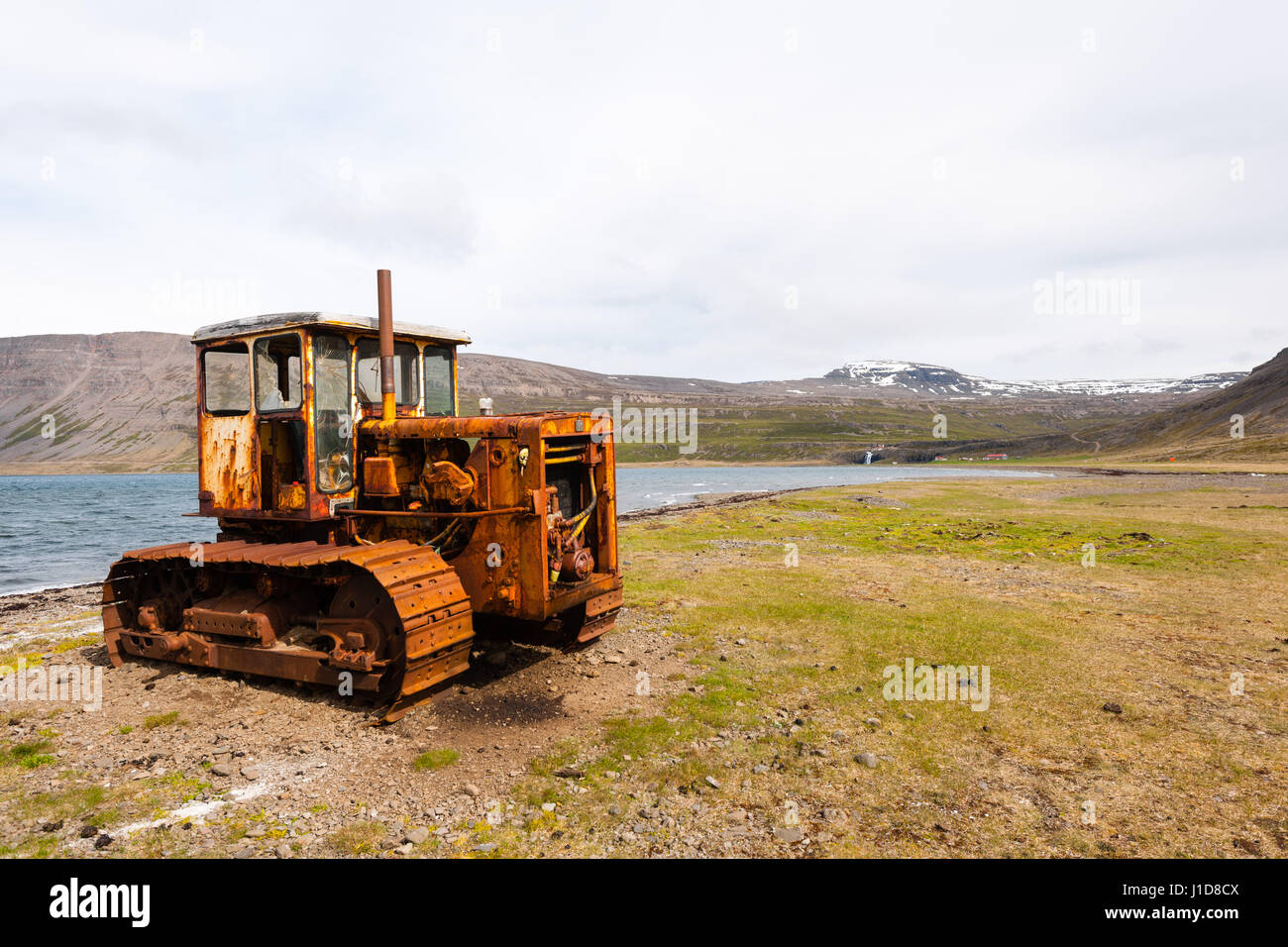 Caterpillar out of function near Bíldudalur, Iceland, Northern Europe Stock Photo