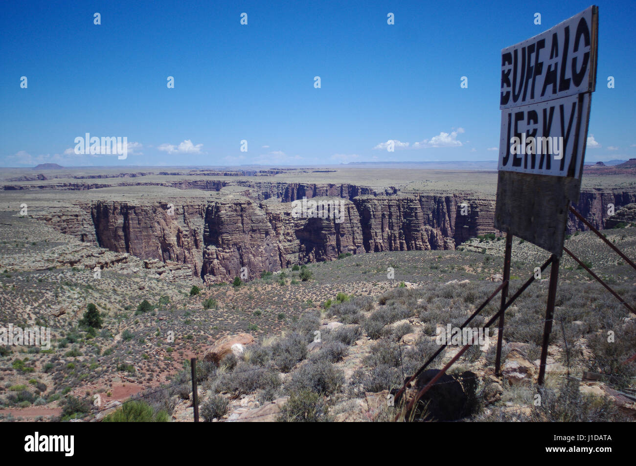 Highway billboard for  Buffalo jerky, a type of beef jerky. View of little colorado river canyon east of grand canyon on desert view drive. Stock Photo