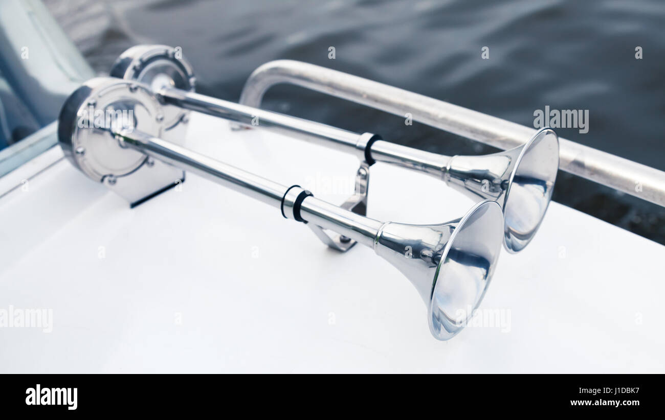 Stainless boat electric horns with chromium plated trumpet, yacht safety equipment Stock Photo