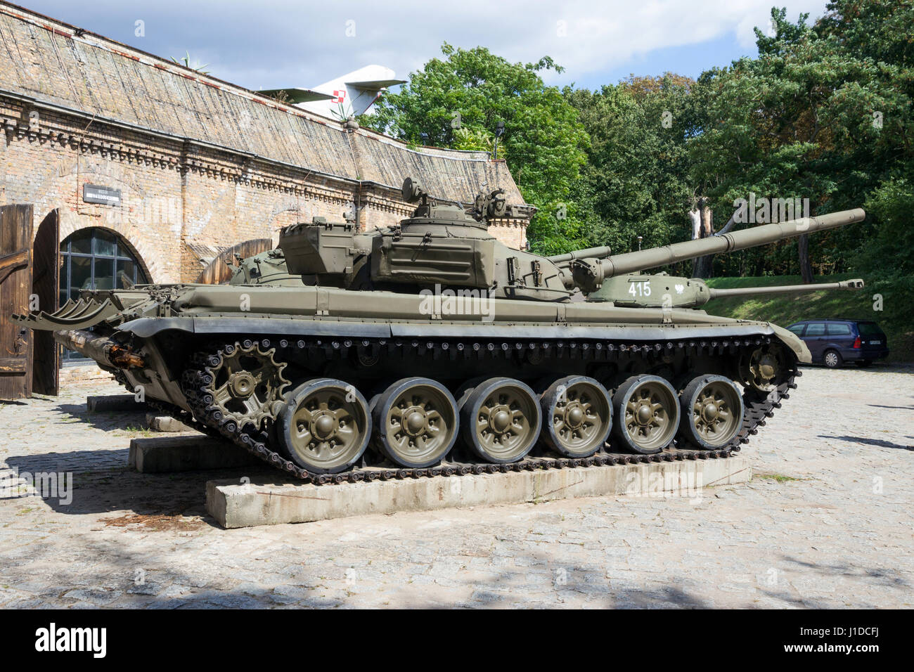 POZNAN, POLAND - AUG 20, 2014: Preserved T-72 tank on display in front of the Poznan Army Museum. Stock Photo