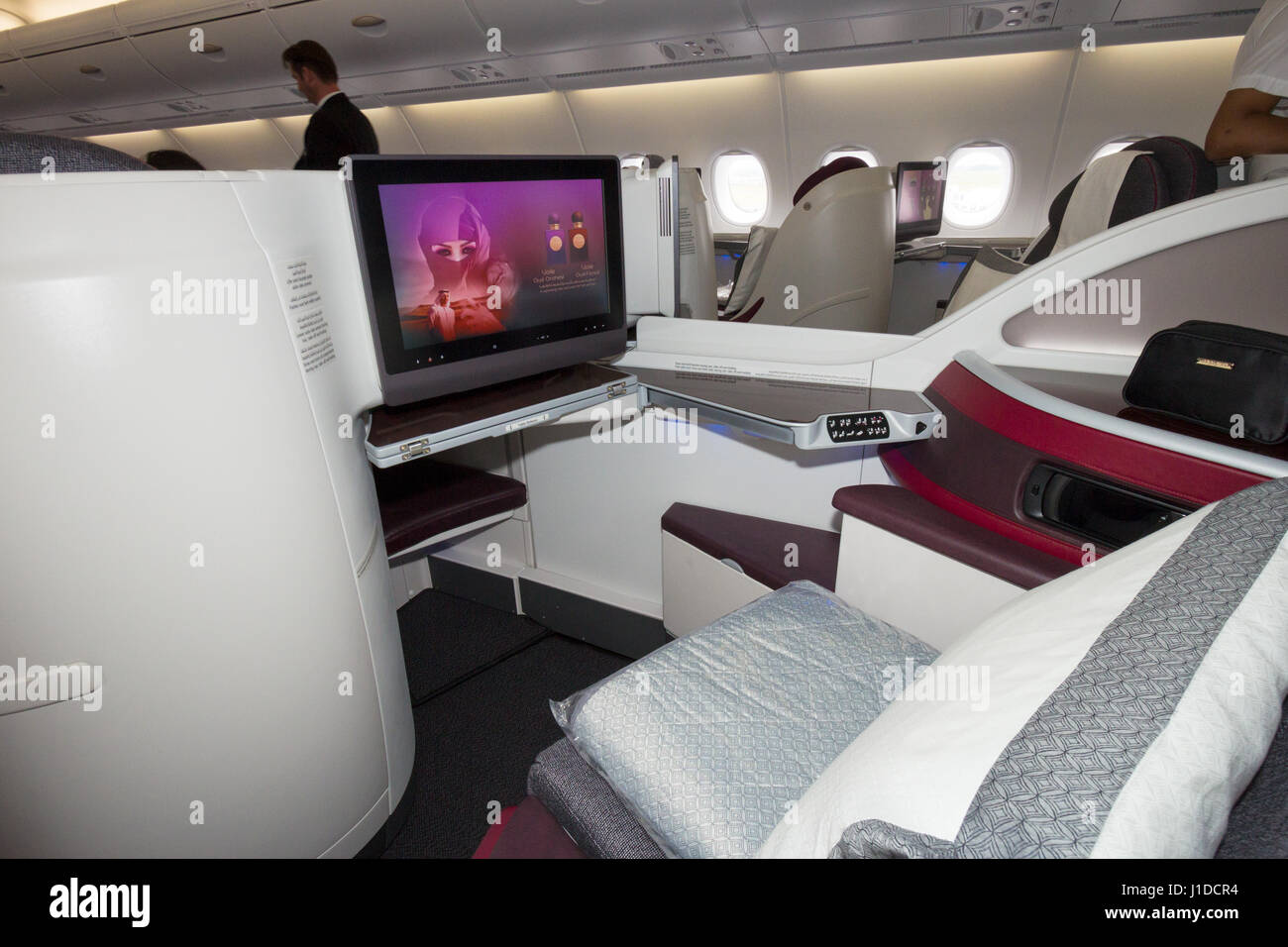 PARIS - JUN 18, 2015: Layout of the Business Class cabin of a Qatar Airways Airbus A380 airplane. Stock Photo