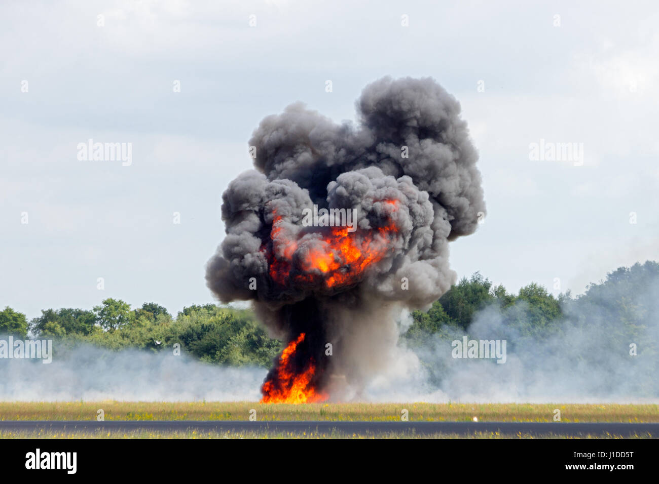 Large explosion with black smoke Stock Photo