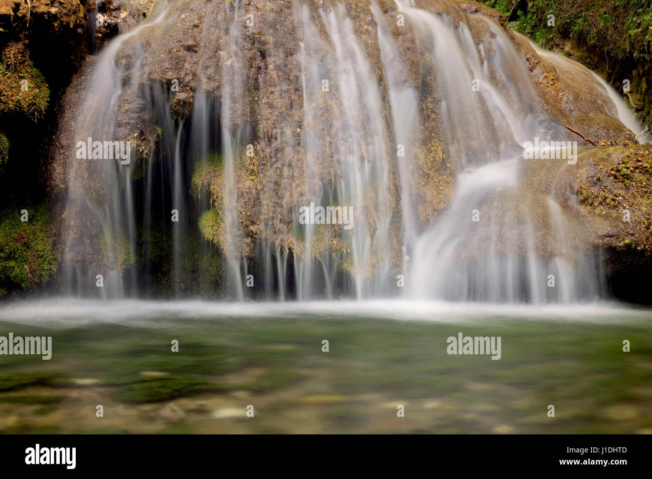 Beautiful mountain waterfall Stock Photo - Alamy