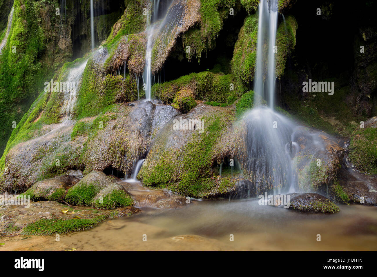 Beautiful mountain waterfall Stock Photo - Alamy