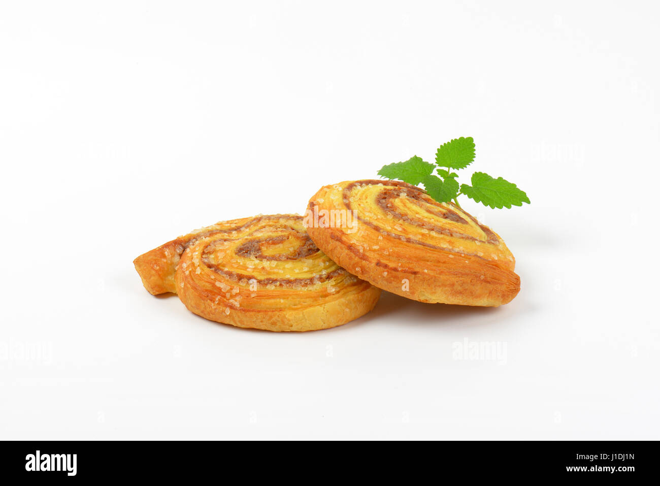 sweet cinnamon rolls on white background Stock Photo - Alamy