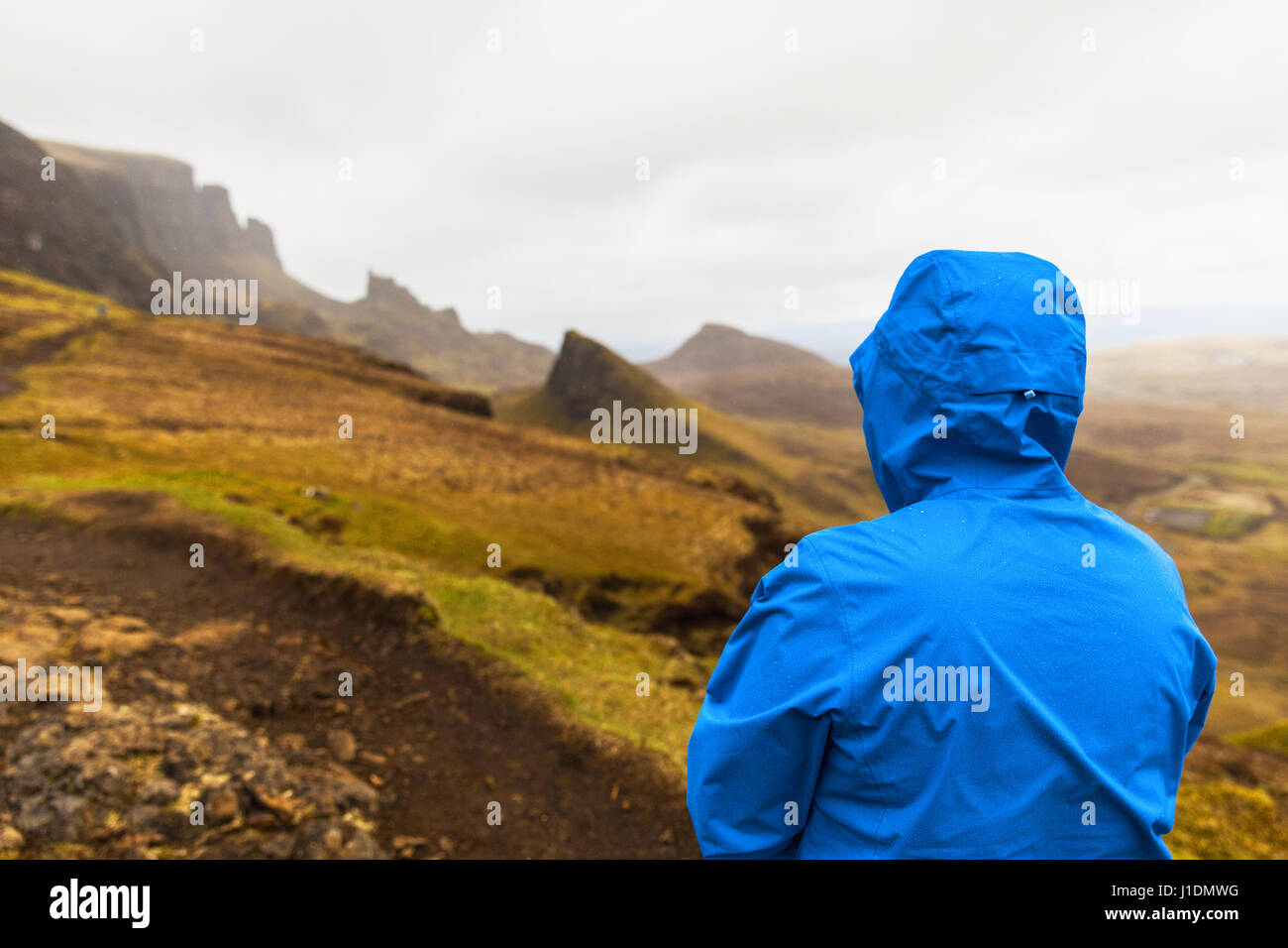 Man in rain jacket at Quiraing, Isle of Skye Stock Photo Alamy