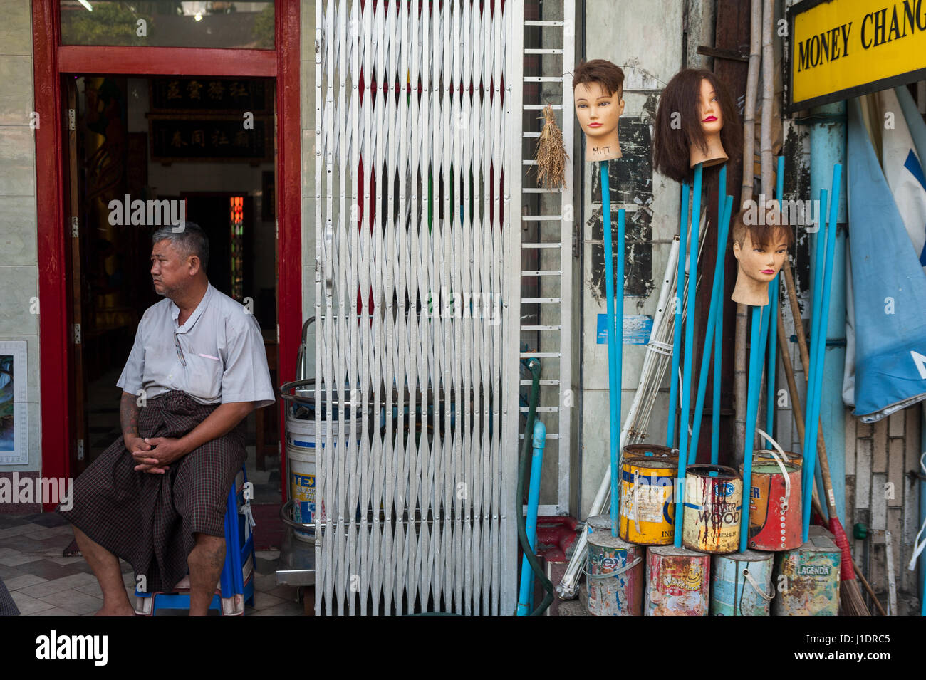 27.01.2017, Yangon, Republic of the Union of Myanmar, Asia A man sits