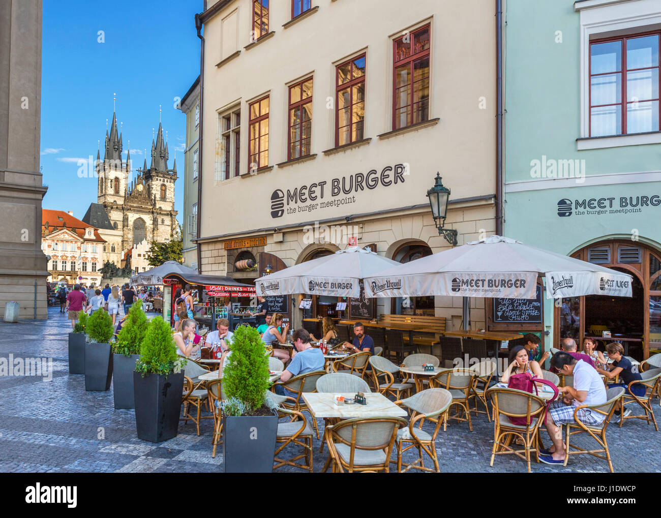 Cafe in Franz Kafka Square (Namesti Franze Kafky) looking towards Old own Square & Church of Our Lady before Tyn, Stare Mesto, Prague, Czech Republic Stock Photo