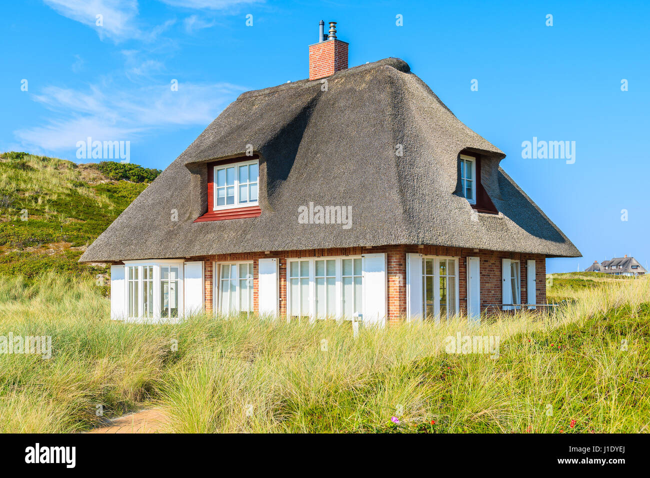 Typical Frisian house in Hornum village on southern coast of Sylt island, Germany Stock Photo