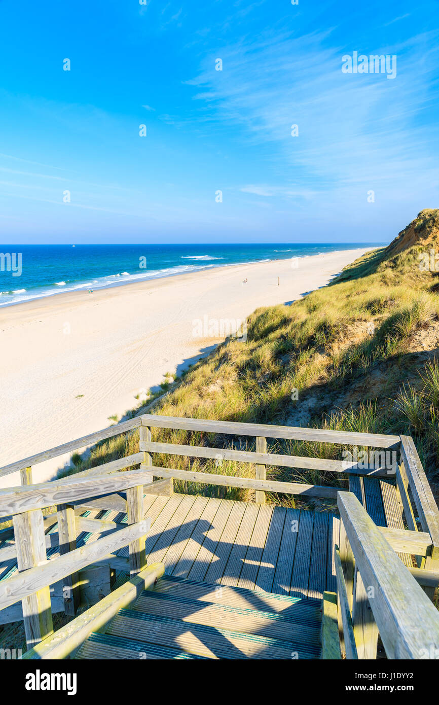 Wooden steps to sandy beach, Sylt island, Germany Stock Photo