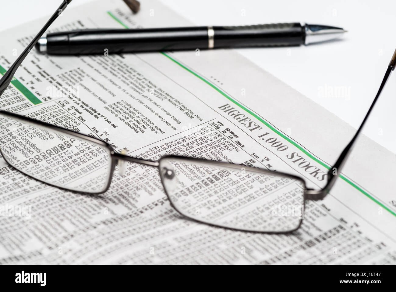 Chicago USA-Feb 12 2017:Glasses and a pen on a Stock Section of The Wall Street Journal Newspaper(for editorial use only) Stock Photo