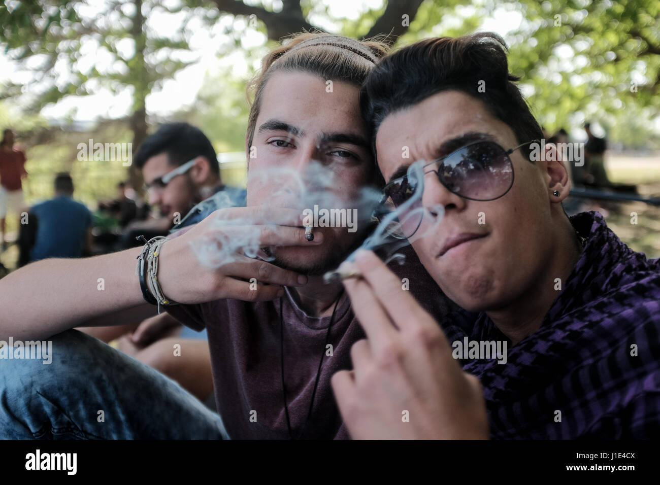 Jerusalem, Israel. 20th April, 2017. Activists for legalization of recreational marijuana symbolically meet at 4:20 at the Wohl Rose Park opposite the Knesset Parliament Building for the Big Bong Night, a twelve hour celebration on International Cannabis Day. The April 20 (4/20) celebration began in the 1970s as the time of day after school, 4:20 pm, for high school students in San Rafael, California to meet to smoke marijuana. Credit: Nir Alon/Alamy Live News Stock Photo