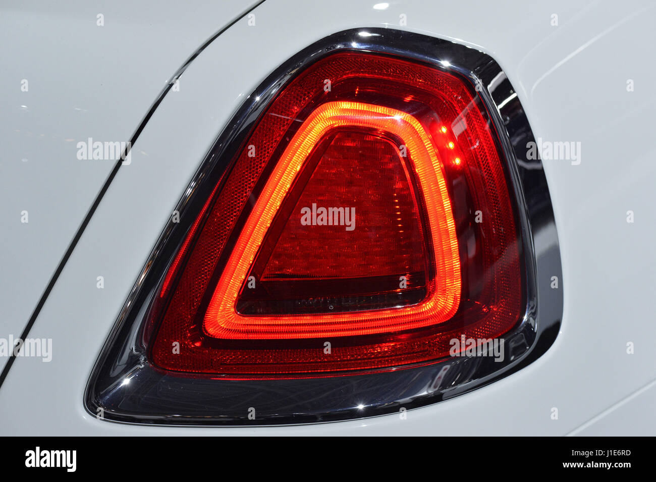 Manhattan, New York, USA. 12th Apr, 2017. Tail light closeup of white 2017 Rolls-Royce Dawn convertible, which is on display at the New York Auto Show, NYIAS, during the first Press