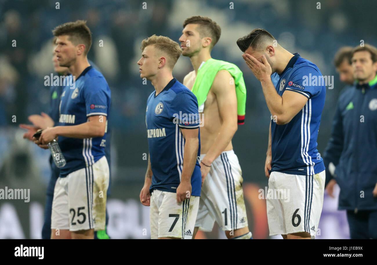 Gelsenkirchen, Germany. 20th Apr, 2017. Schalke's Klaas-Jan Huntelaar, Max Meyer, Torwart Ralf Fährmann and Sead Kolasinac (l-r) leave the field at the end of the second leg of the UEFA Europa League quarter final tie between FC Schalke 04 and AFC Ajax in the Veltins Arena in Gelsenkirchen, Germany, 20 April 2017. The game finished 3:2 on the night and 3:4 on aggregate. Photo: Ina Fassbender/dpa/Alamy Live News Stock Photo