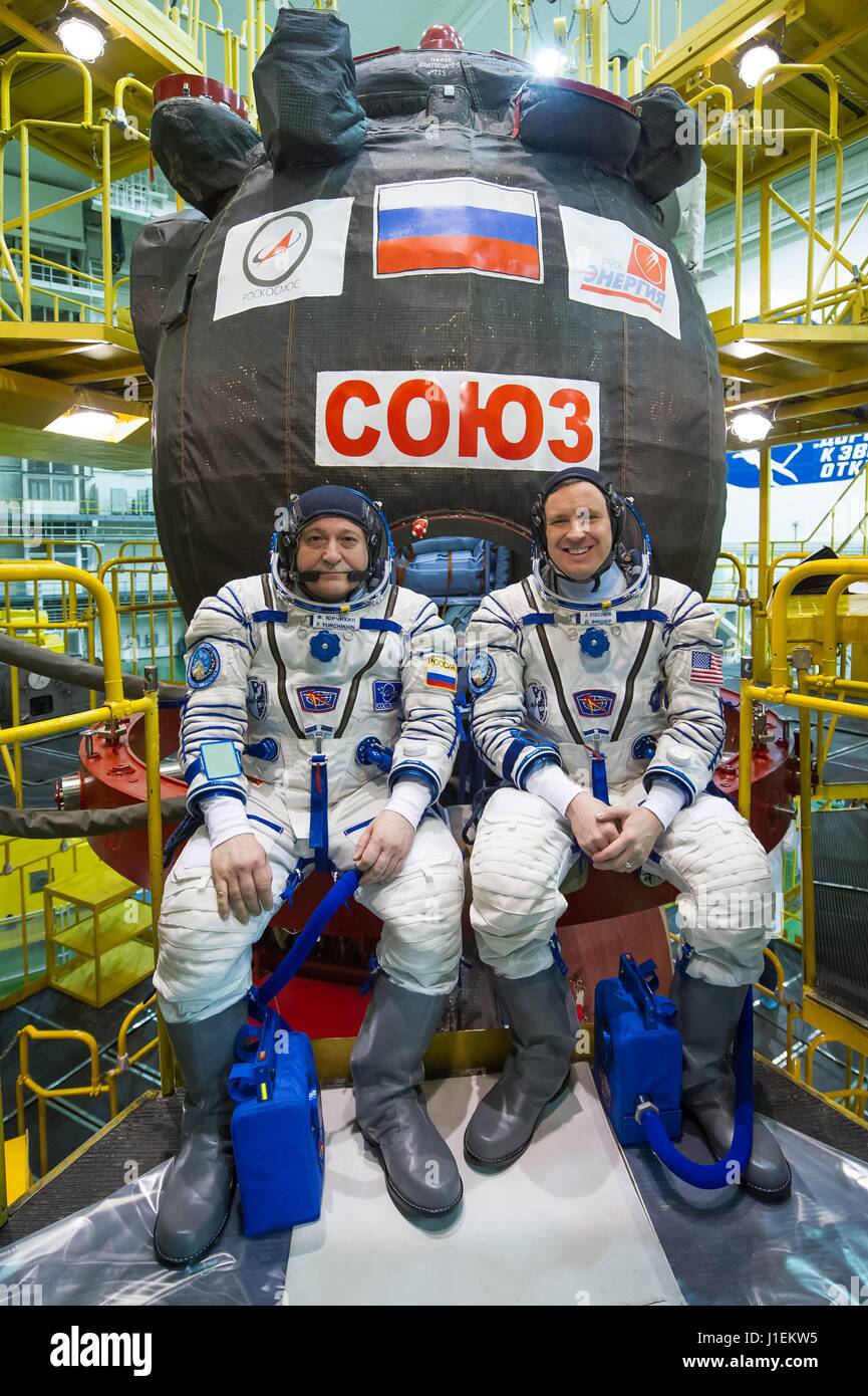 NASA International Space Station Expedition 51 prime crew members Russian cosmonaut Fyodor Yurchikhin of Roscosmos (left) and American astronaut Jack Fischer pose in front of their Soyuz MS-04 spacecraft during pre-launch preparations at the Baikonur Cosmodrome Integration Building April 6, 2017 in Baikonur, Kazakhstan.      (photo by Andrey Shelepin /NASA   via Planetpix) Stock Photo