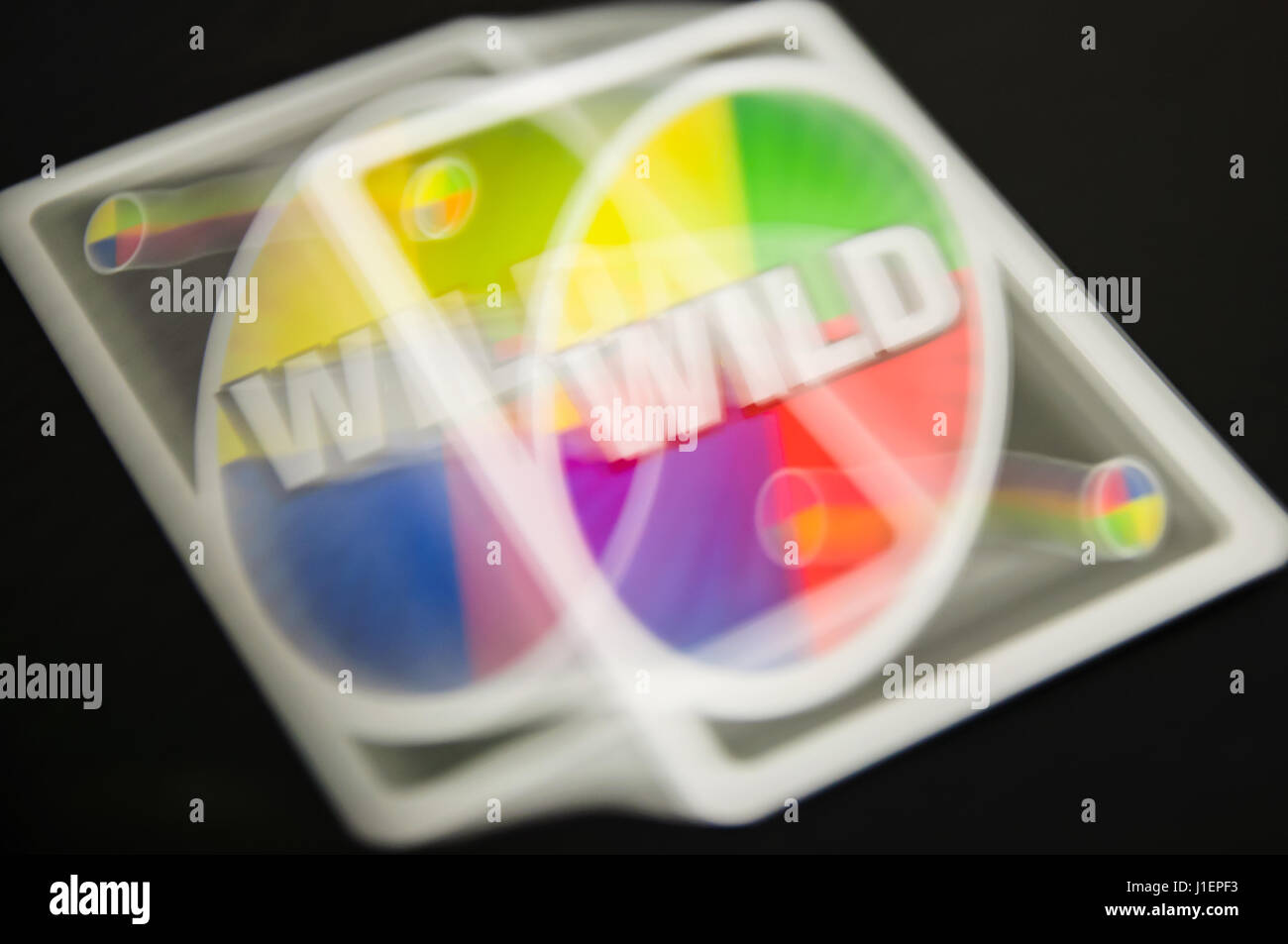 Blurred double image of an Uno wild card. Stock Photo