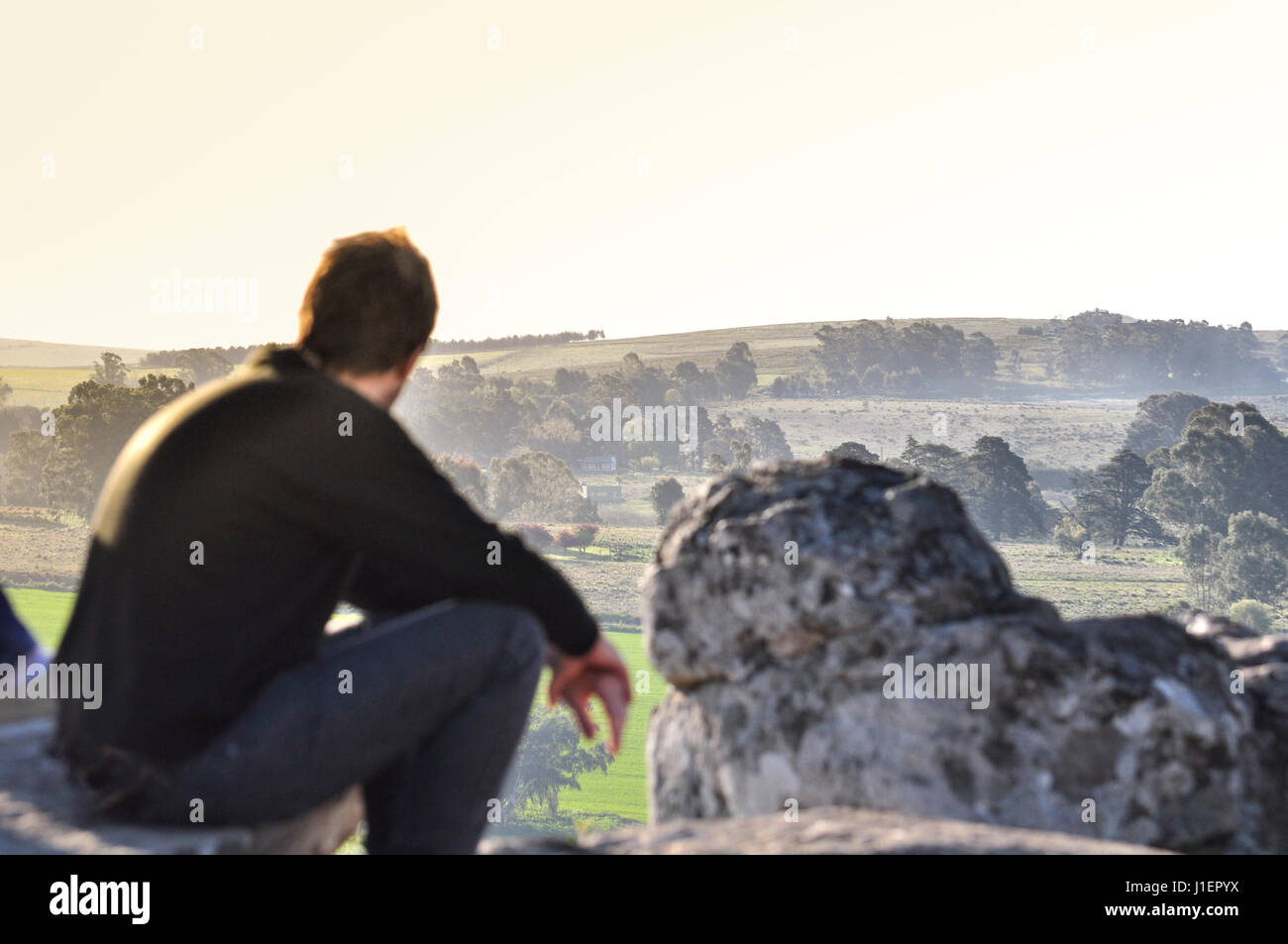 Man watching the landscape in Tandil, Buenos Aires, Argentina Stock Photo