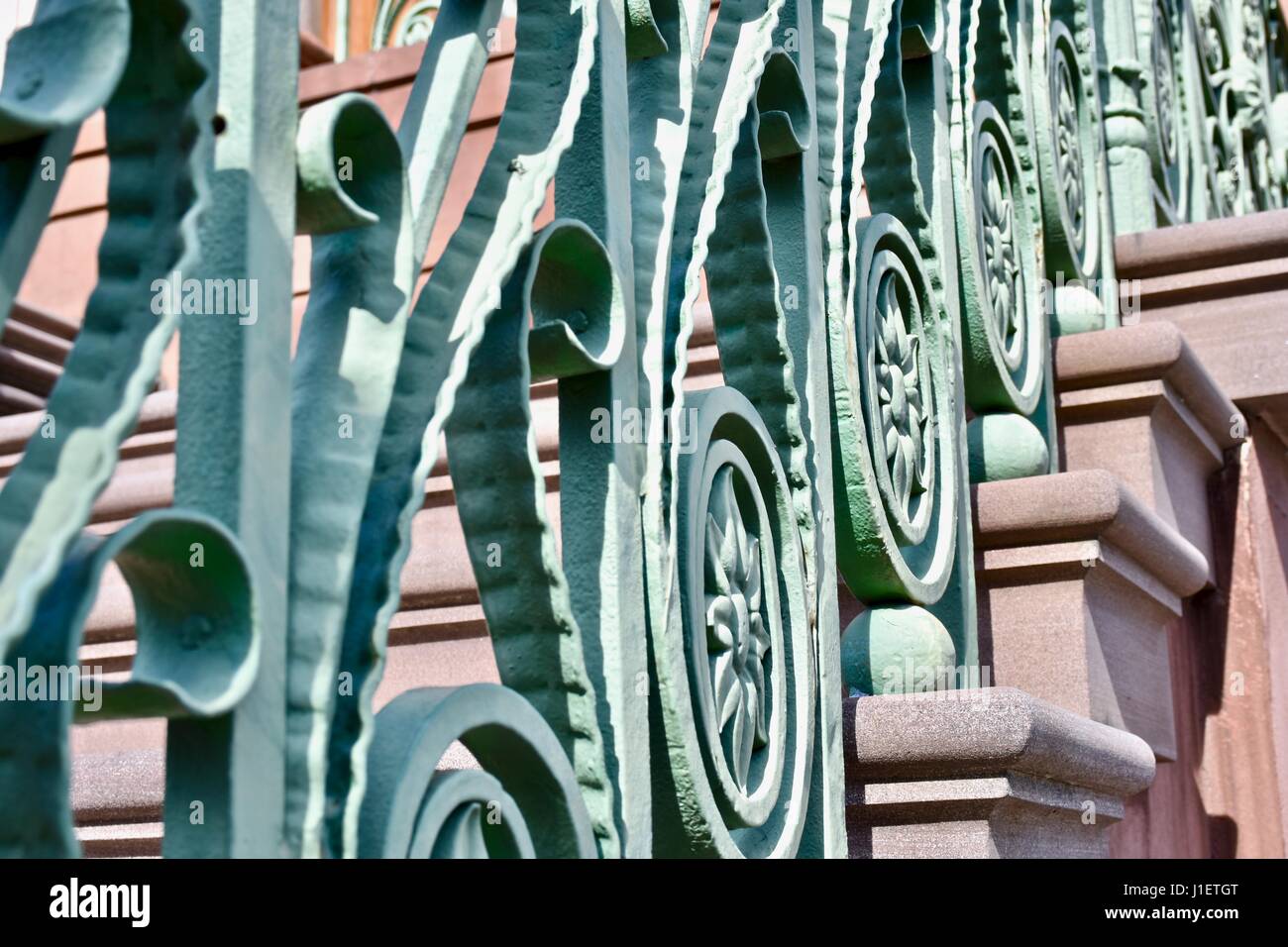 Gand rail leading up stairs Stock Photo