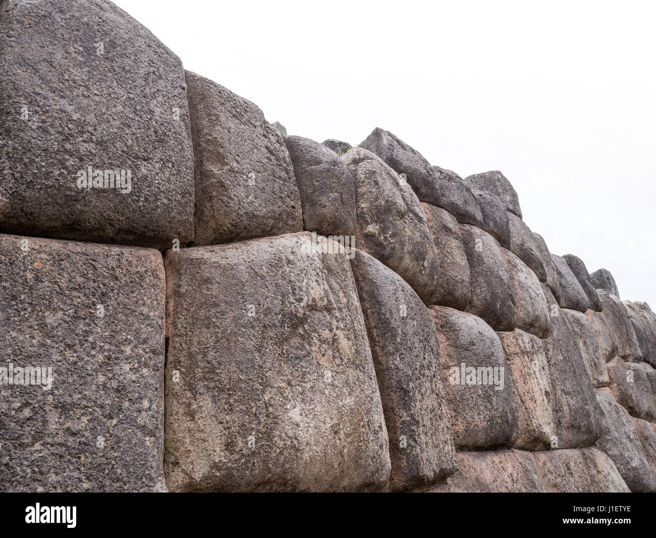 Ancient Inca Wall Detail of an ancient Inca wall in Sacsayhuaman, near Cusco, in Peru ...