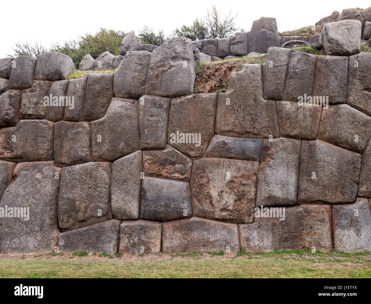 Ancient Inca Wall Detail of an ancient Inca wall in Sacsayhuaman, near Cusco, in Peru ...