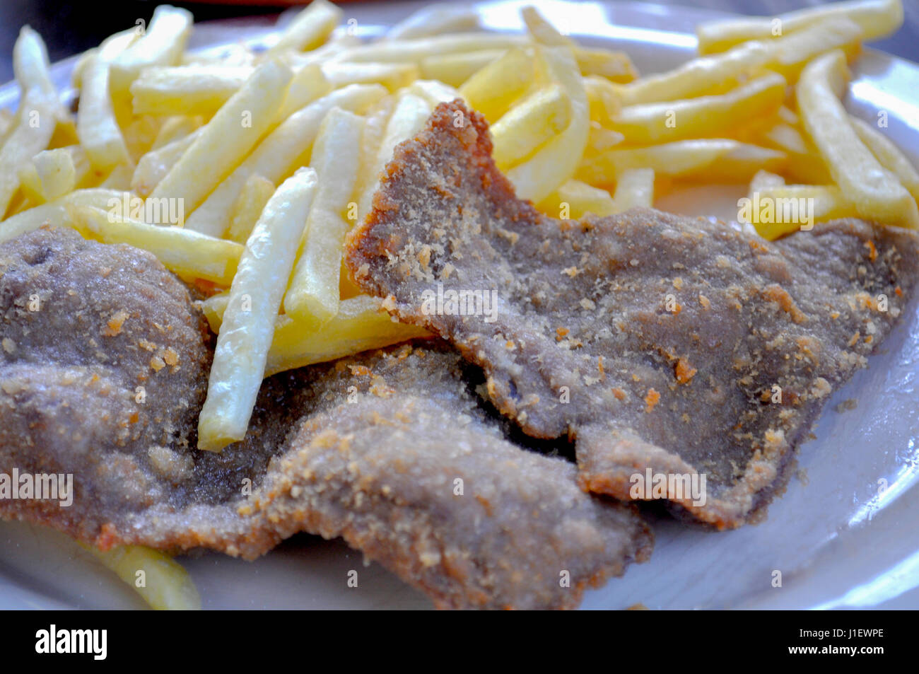 Steak meat fried with french fries Stock Photo