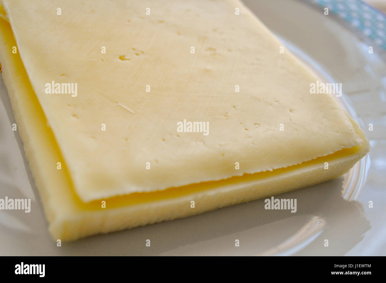 Slices of Gouda Cheese Stock Photo Alamy