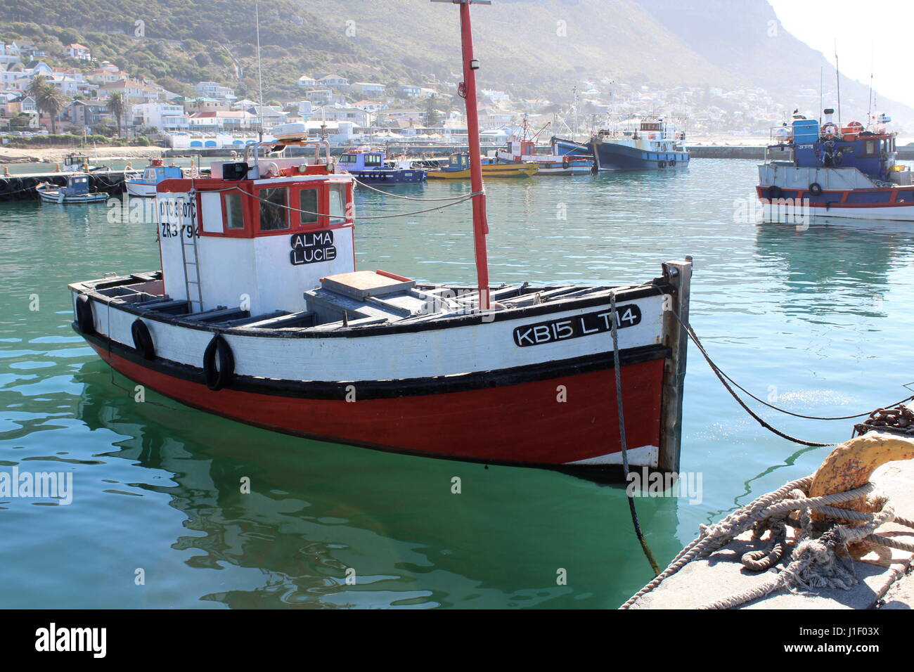 Fishing boats at Kalk Bay harbour, Cape Town, South Africa Stock Photo