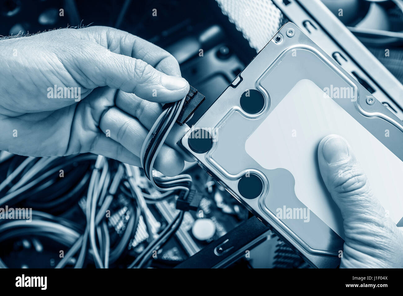 Connect the hard drive. Stock Photo